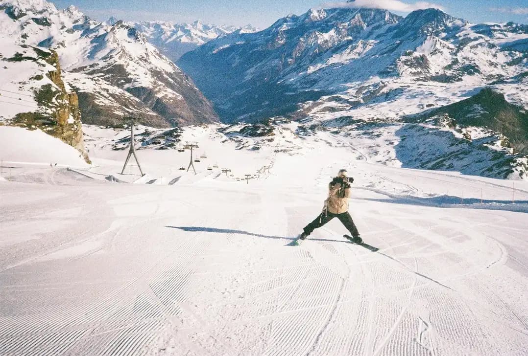 Celestin Photography capturing a skier on the slopes in front of the Matterhorn in Zermatt